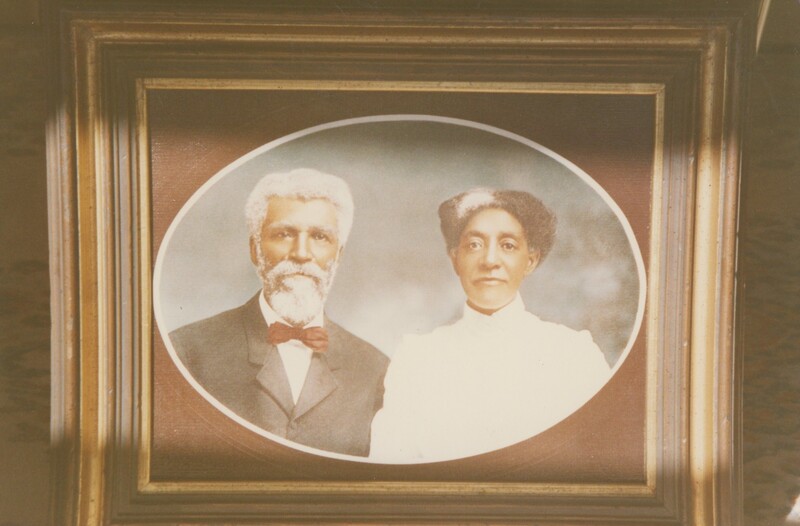 Two people taking a professional portrait.