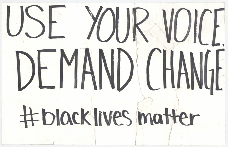 White cardstock sign. "USE YOUR VOICE, DEMAND CHANGE, #blacklivesmatter," handwritten in black ink at anterior.


One of three such posters taped to lightposts at the intersections of Washington and W Park and Washington and W 4th in Waterloo, Iowa, before the George Floyd protest march of the night of 6/2-6/3/2020. The March began at the Black Hawk Co. Jail and was ultimately broken up by the Waterloo Police Department in Washington Park and on the 218 overpass. Grout Museum District staff collected the signs after they blew down in a storm on 6/5/2020.