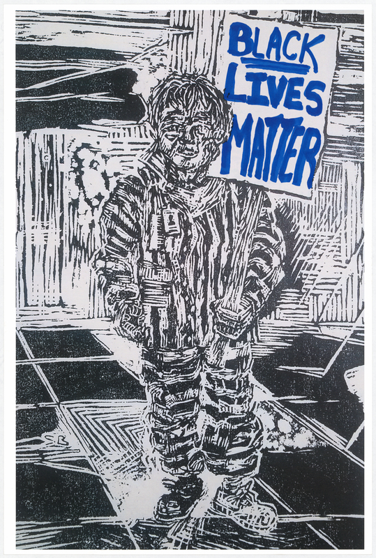 Wood cut print in black ink on white cardstock. Image at anterior depicts a prisoner holding a protest sign. “BLACK LIVES MATTER” handwritten in blue felt-tip marker. "BLACK LIVES MATTER" handwritten in black felt-tip marker at posterior.

Used at the May 29 march from Veterans Memorial Hall to Lincoln Park in Waterloo and at the June 6 “Silent Vigil in Solidarity with BLM” held in Overman Park in Cedar Falls.

Artist’s statement:  
"I handed out, between C.F. Vigil for Floyd and Waterloo march, roughly 150 posters.  Each poster is a woodcut print, made by myself, w/ a different handwritten message on each print to help inform the public about racial disparity/inequality in Iowa/America.  I was only able to track down 21 of the originals, as I handed out every print free to strangers and other people I do not have direct contact with at all.  The signs/prints (original art on the one side w/ BLACK LIVES MATTER wrote [sic] on the reverse side) were held by marchers/protestors, so they have come full circle from myself (the artist) to the people (protestors/citizens) then back to me, and lastly to you all at the Grout Museum for archival and historical purposes . . . very cool." 