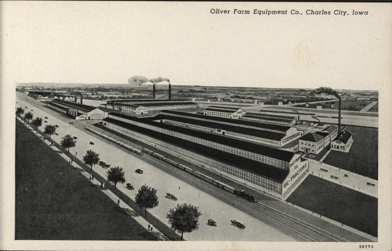 Photographic postcard depicting the Oliver Farm Equipment plant in Charles City, IA.