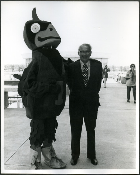 John Vincent Atanasoff is standing next to the Iowa State University mascot, Cy. Dr. Atanasoff is an honored guest at VEISHEA being recognized for his achievement in building the first electronic digital computer in 1930s and early 1940s.