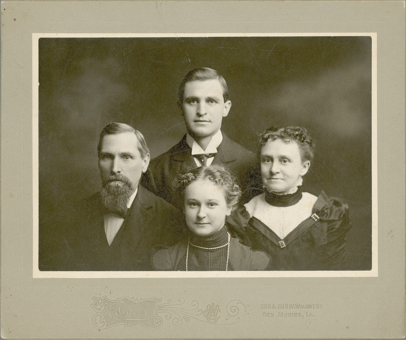 Budd family portrait with Joseph Lancaster Budd and Sarah Breed Budd with their children, Etta May and Allen Joseph. It was at Etta May Budd's urging that George Washington Carver transfer to Iowa State from Simpson College to study agriculture. Carver's first love was art, but Miss Budd feared that he would be unable to make a living as an artist. She felt it would be more practical to pursue another of his interests, plant science. She suggested he go to Iowa State, where her father, Joseph Lancaster Budd, was Head of the Horticulture Department from 1877 to 1900. Neg. 0039585.