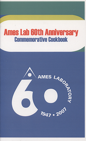 A commemorative cookbook compiled to celebrate the 60th anniversary of the Ames Laboratory, featuring recipes contributed by staff and affiliates. The cookbook is organized into sections by recipe type, such as appetizers, main dishes, desserts, and more.