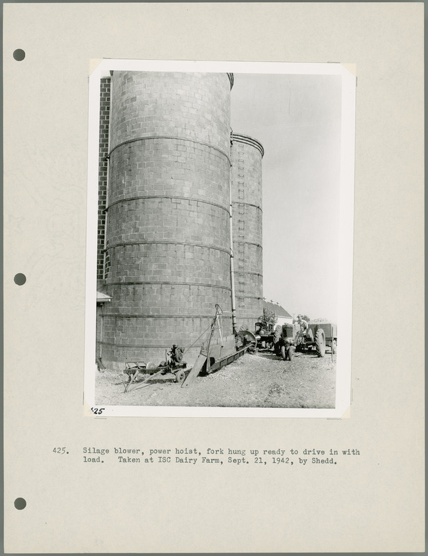 Silage blower, power hoist, fork hung up ready to drive in with load. Taken at Iowa State College [ISC] Dairy Farm, Sept. 21, 1942, by Shedd.