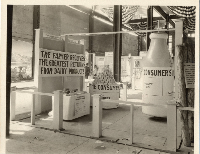 Photograph of a Dairy Industry Exhibit by Iowa State College (University) at the Iowa State Fair in 1921.
