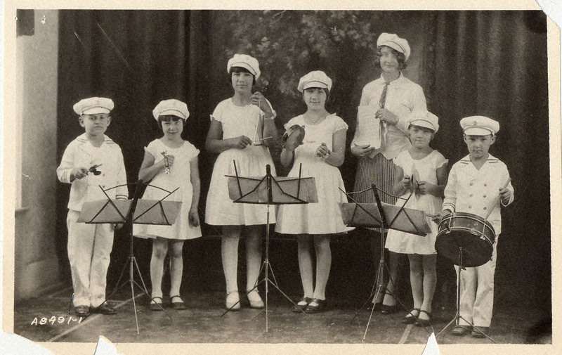 Photograph of an orchestra made up of a group of children. Taken in 1929.