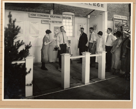 Photograph of a Vocational Education, Foods, and Nutrition/Home Economics Booth at the Iowa State Fair in 1925.