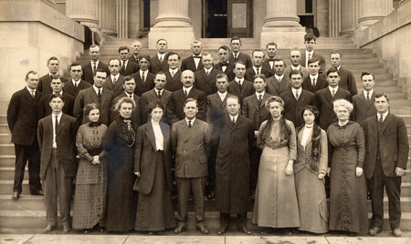 Photograph of Iowa State College's (University's) Extension Force in front of Curtiss Hall in 1913.