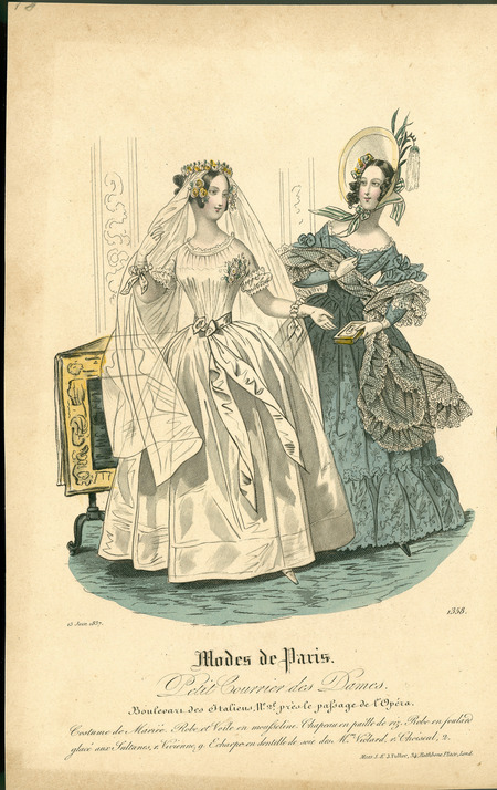 Woman's wedding dress with a simpler bodice, jewel neckline, lace-trimmed short sleeves, gloves, a ribbon tied around waist, and a floor length, full skirt; the veil is attached to a floral crown and is decorated with flowers. The accompanying dress has a shirred bodice, wide neckline trimmed in lace, long sleeves with elaborate upper arm trim, yoke waistline; a floor-length, full skirt, a lace shawl with ruffled edges, and a spoon bonnet with flowers and ribbons. (Published for Modes de Paris by S. & J. Fuller, London).