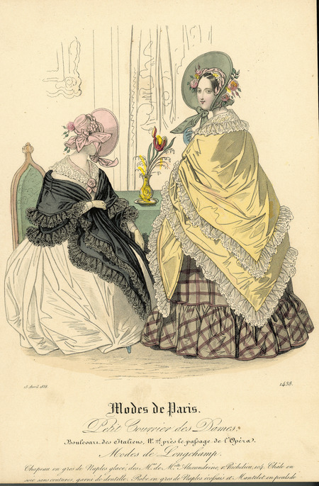 Two women's dresses, both covered with increasingly large, lace-trimmed shawls, both have lace collars, gloves; floor-length, full skirts, and bonnets trimmed with flowers and ribbons. (Published for Modes de Paris).