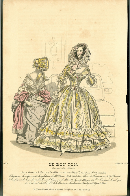 Two receiving dresses, both with wide necklines trimmed with lace, long sleeves with fitted lower portions, small waists, and long, full skirts. Left dress has a pleated bodice with lace trim, puffy upper sleeves, and a shawl. Right dress has fitted bodice, ruffled upper sleeves and 2 rows of ruffles above hem. Both have bonnets that frame the face and trimmed with lace, ribbons and flowers. (Published for Le Bon Ton by Manuel Godquin, New York).