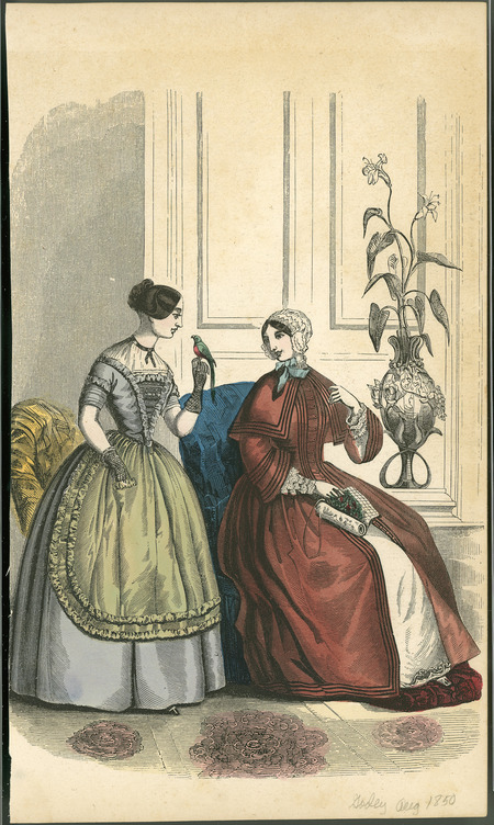 Fashions for August, showing Home Costumes. The dress on the left has a chemisette insert with a jewel neckline edged with ribbon, short sleeves, a full skirt with an attached apron edged with 2 rows of ruffles or puffed fabric, net mitts, and a simple hairdo. The right figure wears a full robe with an attached shoulder cape, pagoda sleeves on robe and long, ruffled cuff sleeves on the gown, button front opening only buttoned partway to reveal the simple gown beneath, worn with a lace breakfast cap. (Published for Godey's Ladies Book).