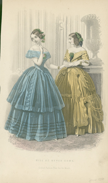 Two women at home. The left dress is blue silk with a double skirt, the longest being finished with narrow satin piping, a main work of the same extending on each side of the tunic. The Bertha collar is trimmed to correspond. The hair is dress plainly, with a wreath of flowers and foliage, and a matching corsage. The right dress is of corn-colored crepe lisse, with triple skirts, looped up by flowers of the same color. A corsage of grapes and vine leaves (Grecian corsage) and similar hair dressing is displayed (Published for Godey's Fashion Plate for the Month).