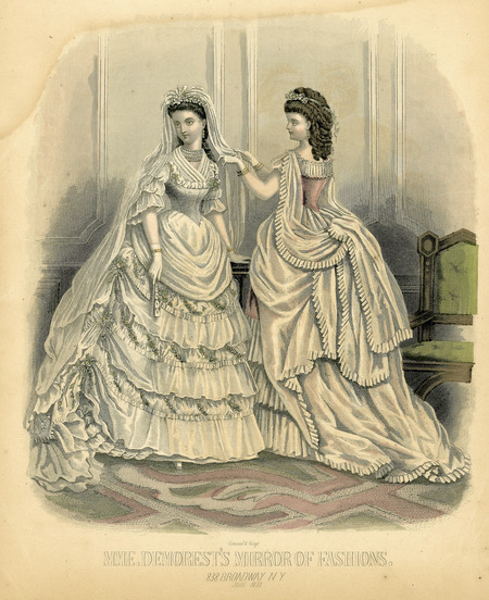 Wedding dress with multiple flounced and ruffled overskirts, square neckline filled with scarf, elbow length sleeves with three puffs, full length veil, with 4 strands of pearls around neck, gloves, a fan and dress and veil trimmed with flowers. Bridesmaid dress has square neckline, short sleeves, bustle skirt with multiple gathers enhancing the bustle, flowers in hair. Both waists come to point at center front and center back. (published by Mme. Demorest's Mirror of Fashions).