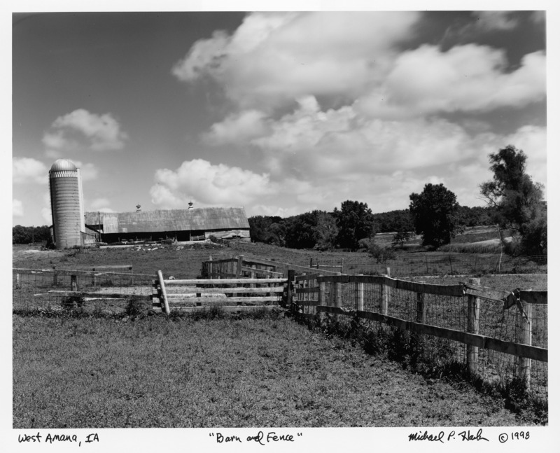 Photograph of a barn taken in West Amana, Iowa, entitled "Barn and Fence."
