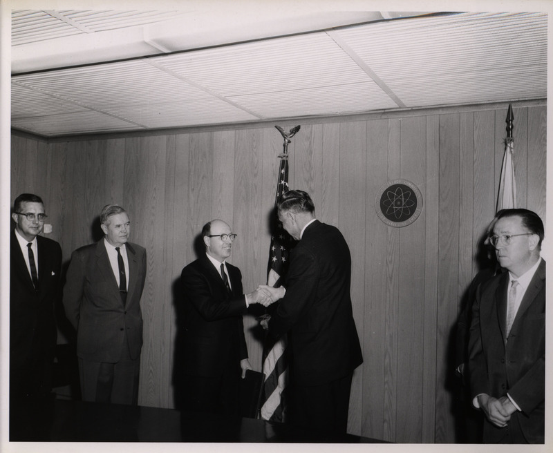 Photograph of Dwight Ink and others during Ink's Distinguished Service Award ceremony