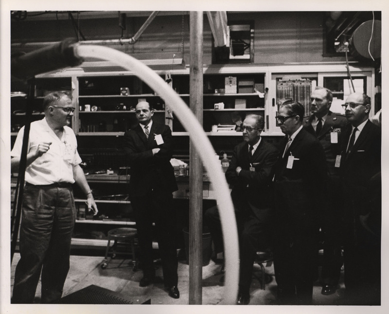Photograph of Dwight Ink with others at the Los Alamos National Laboratory