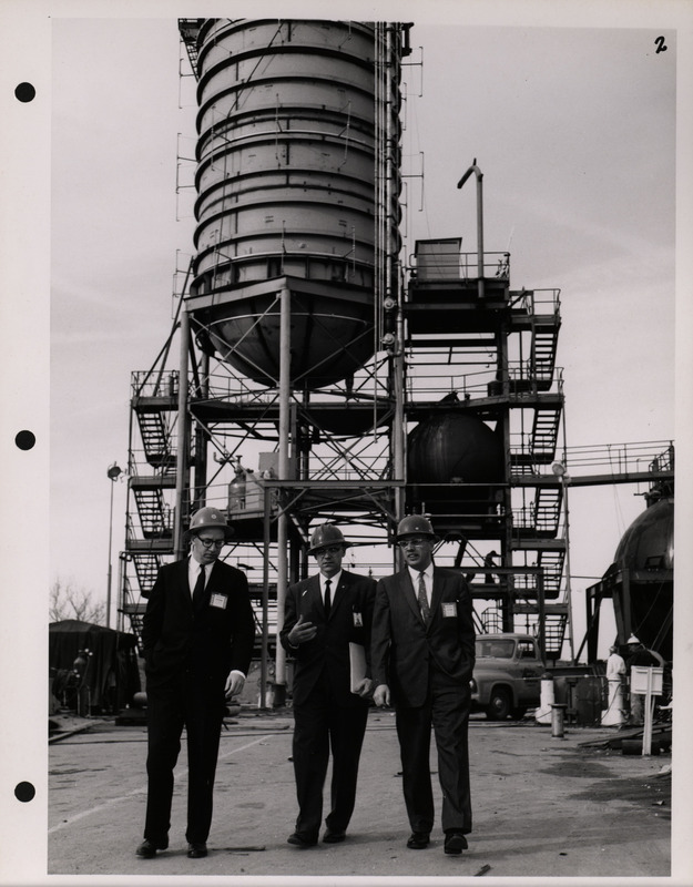 Photograph of Dwight Ink with others during the National Aeronautics and Space Administration and Atomic Energy Commission rocket plant visit