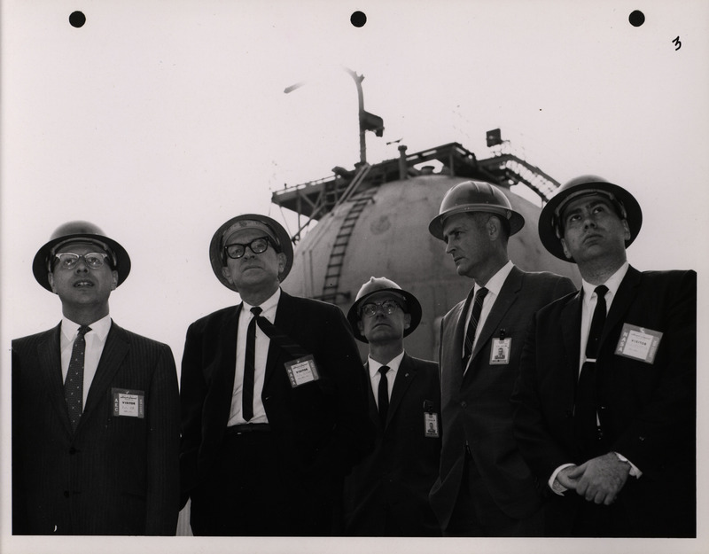 Photograph of Dwight Ink with others during the National Aeronautics and Space Administration and Atomic Energy Commission rocket plant visit