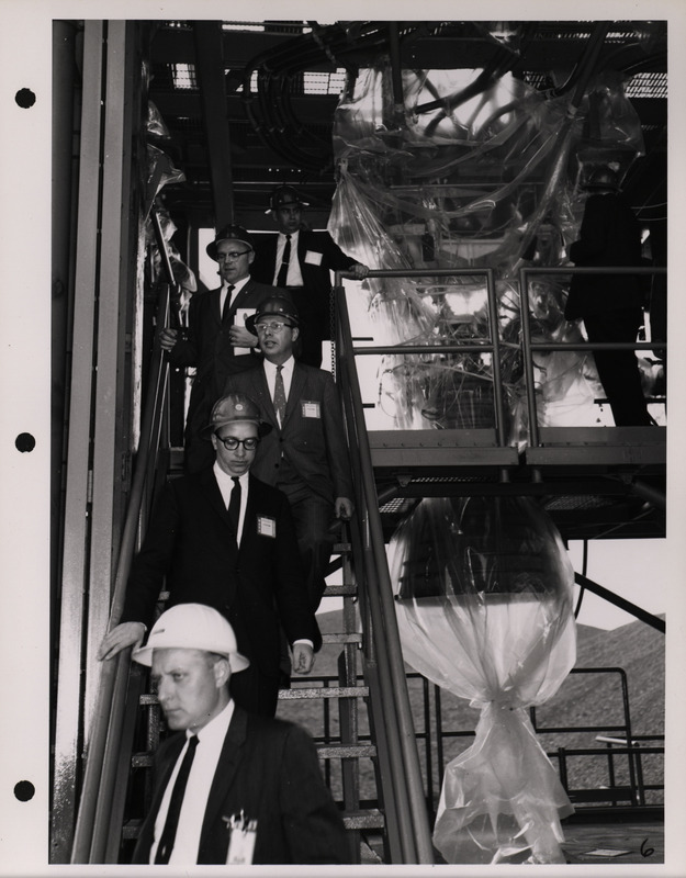 Photograph of Dwight Ink with others during the National Aeronautics and Space Administration and Atomic Energy Commission rocket plant visit