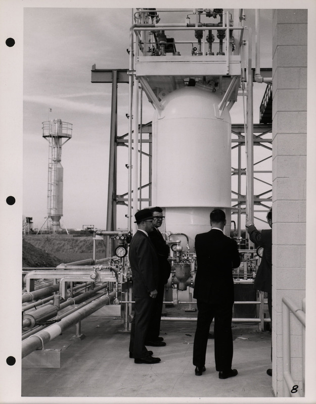 Photograph of Dwight Ink with others during the National Aeronautics and Space Administration and Atomic Energy Commission rocket plant visit