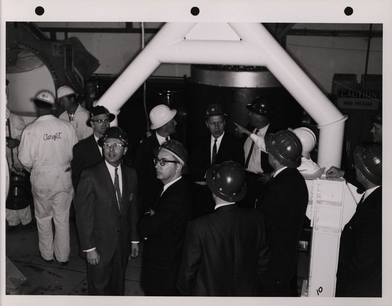 Photograph of Dwight Ink with others during the National Aeronautics and Space Administration and Atomic Energy Commission rocket plant visit