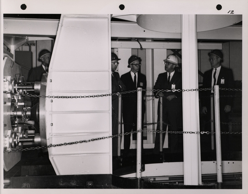 Photograph of Dwight Ink with others during the National Aeronautics and Space Administration and Atomic Energy Commission rocket plant visit