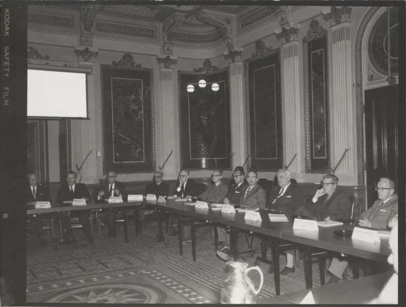 Photograph of group of people sitting around tables at the Indian Treaty Room