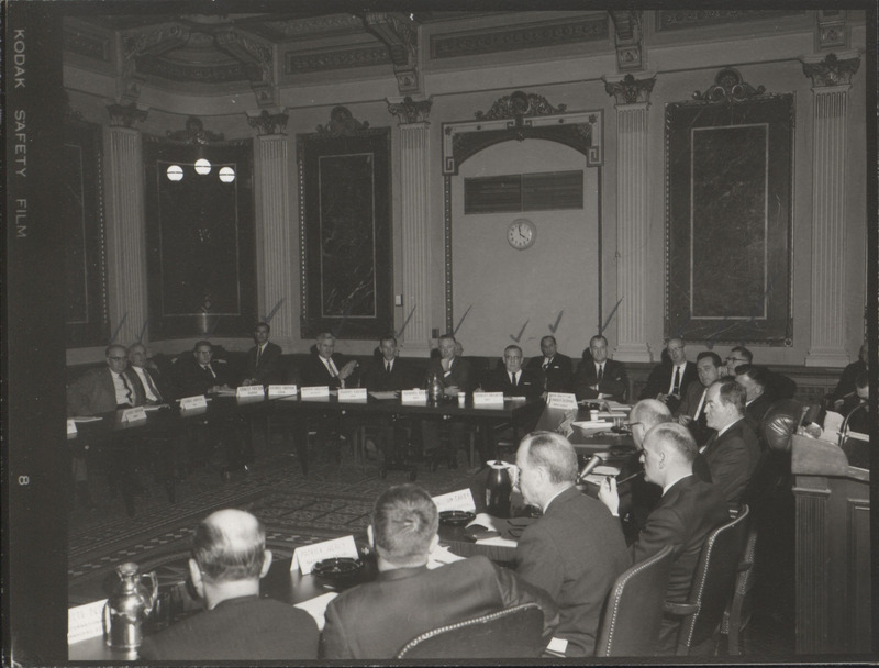 Photograph of group of people sitting around tables at the Indian Treaty Room