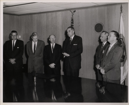 Photograph of Dwight Ink and others during Ink's Distinguished Service Award ceremony
