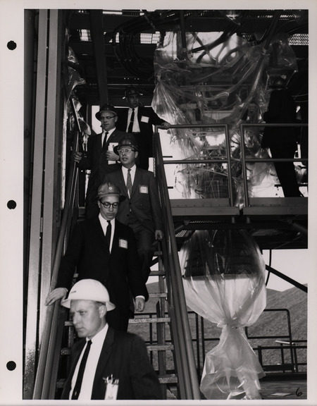 Photograph of Dwight Ink with others during the National Aeronautics and Space Administration and Atomic Energy Commission rocket plant visit