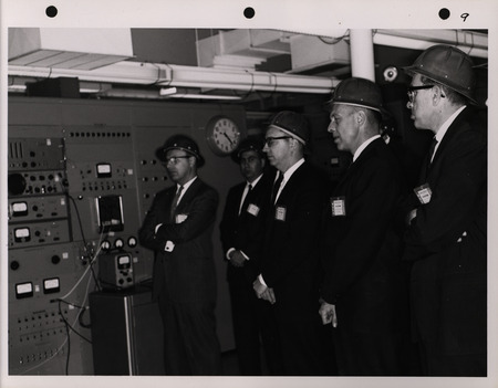 Photograph of Dwight Ink with others during the National Aeronautics and Space Administration and Atomic Energy Commission rocket plant visit