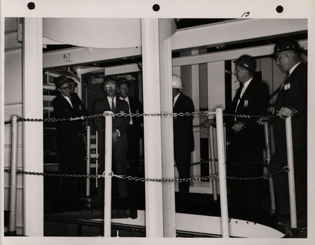Photograph of Dwight Ink with others during the National Aeronautics and Space Administration and Atomic Energy Commission rocket plant visit