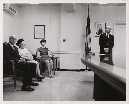 Photograph of Dwight Ink with others during his HUD swearing-in ceremony