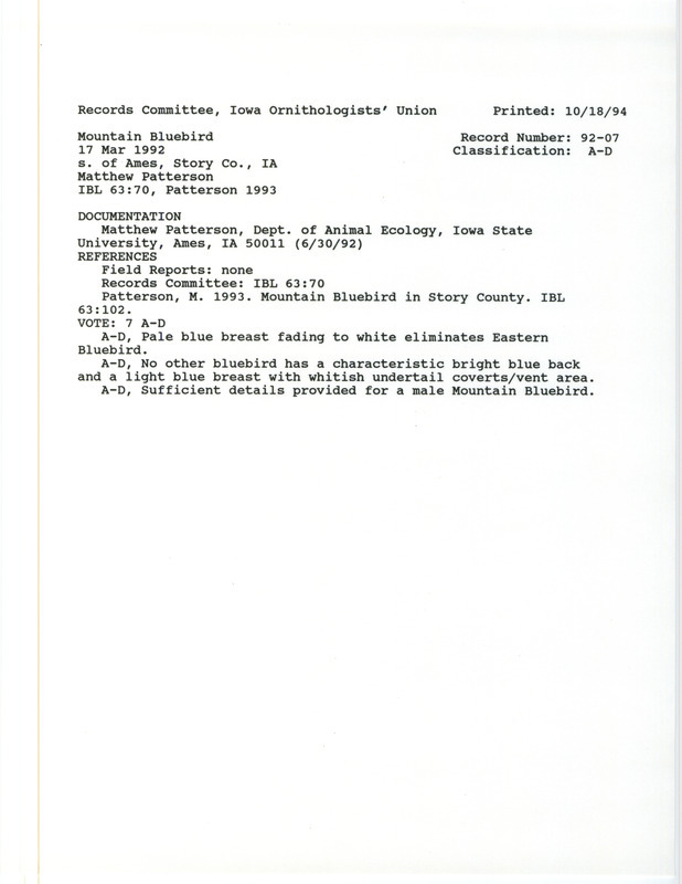 Records Committee review for a Mountain Bluebird at Ames in Story County, IA on March 17, 1992. Includes a record review document with votes, an article in Iowa Bird Life, and a documentation form submitted to the committee.