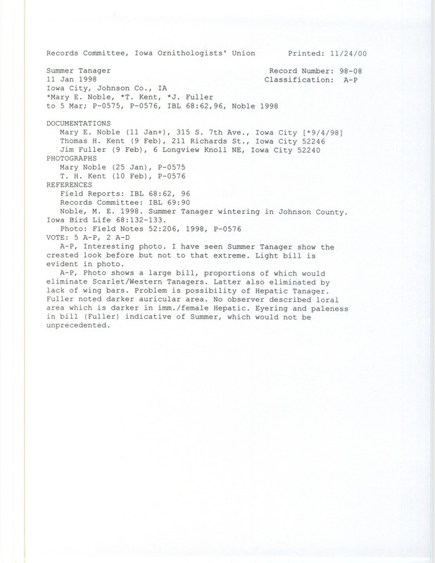 Records Committee review for a Summer Tanager at Iowa City in Johnson County, IA on January 11, 1998. Includes a record review document with votes, a photo, an article in Field Notes, an article in Iowa Bird Life, an email from Mary E. Noble to Jim Fuller, and two documentation forms submitted to the committee.