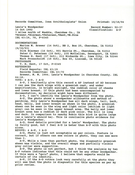 Records Committee review for a Lewis's Woodpecker north of Washta in Cherokee County, IA on October 16, 1992. Includes a record review document with votes, a photograph, an article in Iowa Bird Life, and four documentation forms submitted to the committee.