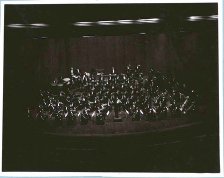 Photograph of the New York Philharmonic performing during the International Orchestra Festival at C.Y. Stephens Auditorium.