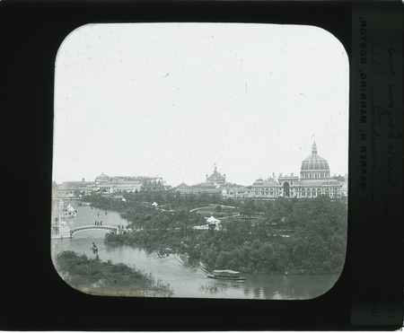 View from across the lagoon and wooded island from Transportation Building, World's Fair.