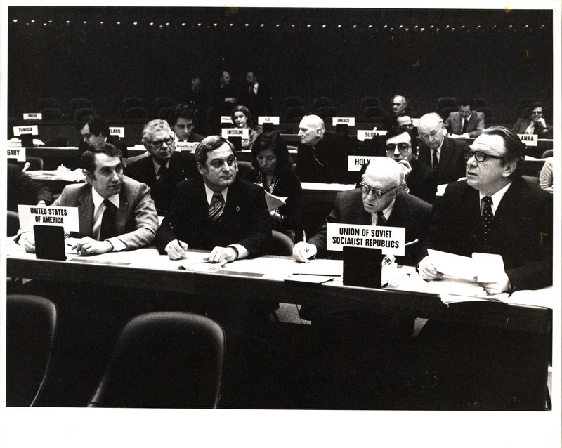 Black-and-white photograph of Edward Mezvinsky at a United Nations meeting sitting near representatives from the Soviet Union.