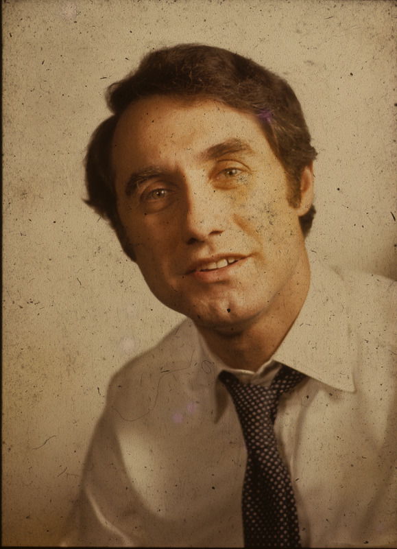 Color photograph of Edward Mezvinsky in a white shirt and a necktie.