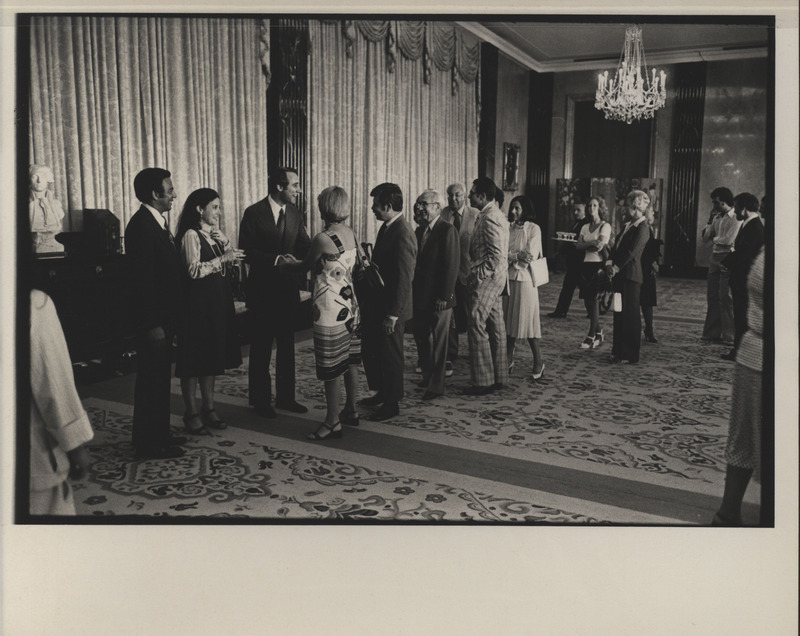 Photograph of Edward M. Mezvinsky greeting guests after his speech during his swearing in ceremony as the U.S. Representative to the United Nations Human Rights Commission.