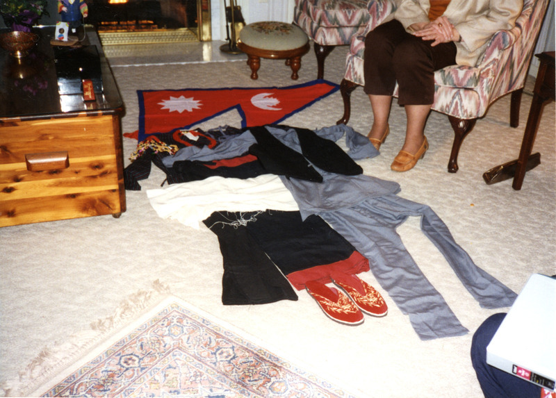 Nepalese attire and flag.