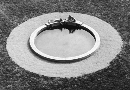 View of Marriage Ring fountain basin (terra-cotta 1942) from above. Located near MacKay Hall. Cco: Silver gelatin photograph on board