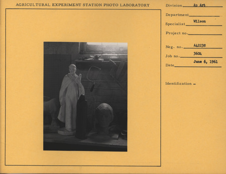 Photograph of the interior of Christian Petersen's studio on Iowa State campus including sculptures "Madonna and Child," "Pegasus in Iowa," "St. Bernard of Clairvaux," and an unknown female bust.