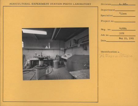 Photograph of Christian Petersen's studio in 1961. The following pieces are visible: "Mildred Finnegan," "Christ with Bound Hands," as well as a mother and child figure.