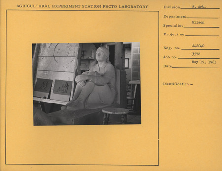 Photograph of Christian Petersen's studio in 1961. The following pieces are visible: "Conversations," seated female, and two clay sketches of "Woman and Child.".