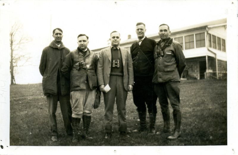 A group photo of the former Iowa Ornithologists' Union presidents who held the position from 1923-1932 and the 1933 president, May 6, 1933. From left to right: Dr. George O. Hendrickson (1933-1934), Dr. F.L.R. Roberts (1931-1932), Walter W. Bennett (1929-1930), Arthur J. Palas (1927-1928) and Walter M. Rosene (1923-1926). The photograph was reproduced in the June, 1933, issue of "Iowa Bird Life." Photograph originally titled "Group photo of IOU presidents." Rosene provides details on back of photograph.