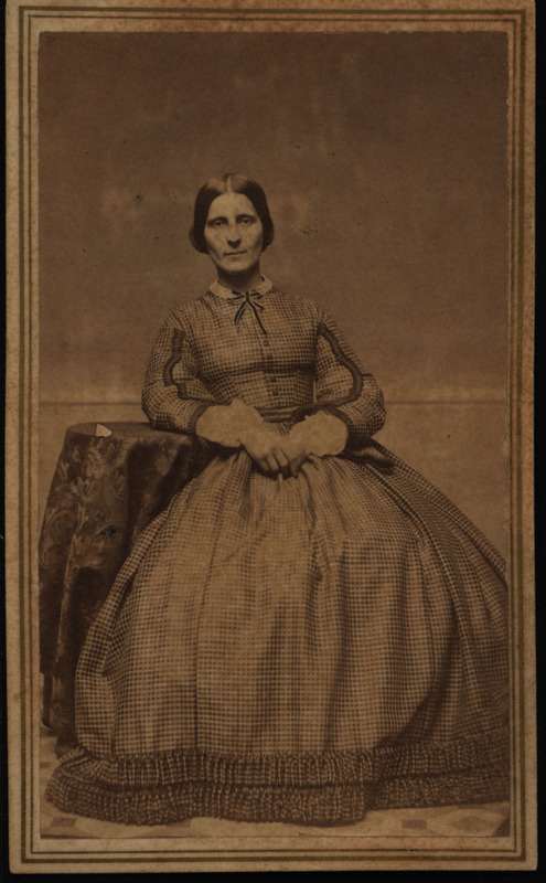 Seated studio portrait of unidentified woman taken at the Mason & Gardner photography studio in Providence, Rhode Island.