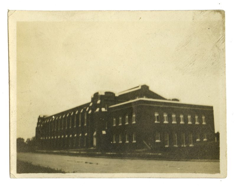 The State Gymnasium is shown soon after completion, viewed from the northwest, in this lighter exposure. Plantings near the road are very small.